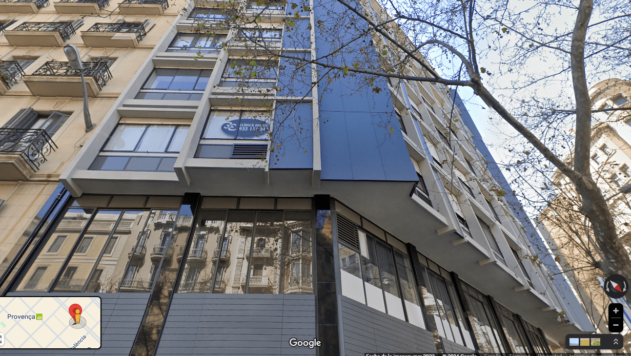 Photographic reference showing the building’s chamfered corner.